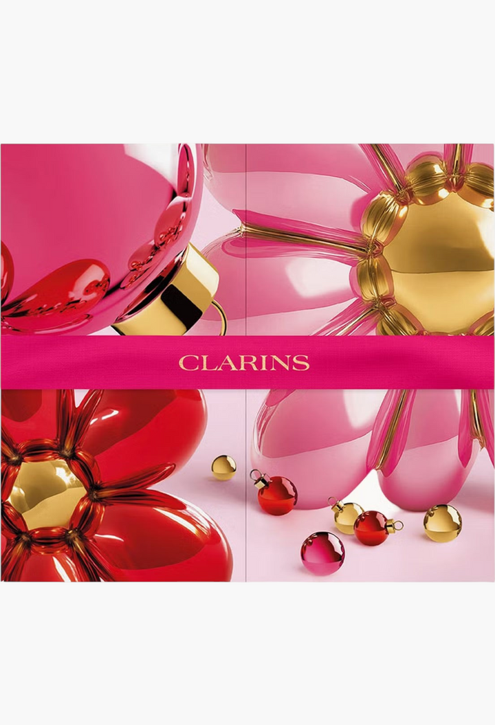 GLAM MODA Clarins 12 Day Beauty Calendar featuring festive pink and red floral designs with gold accents