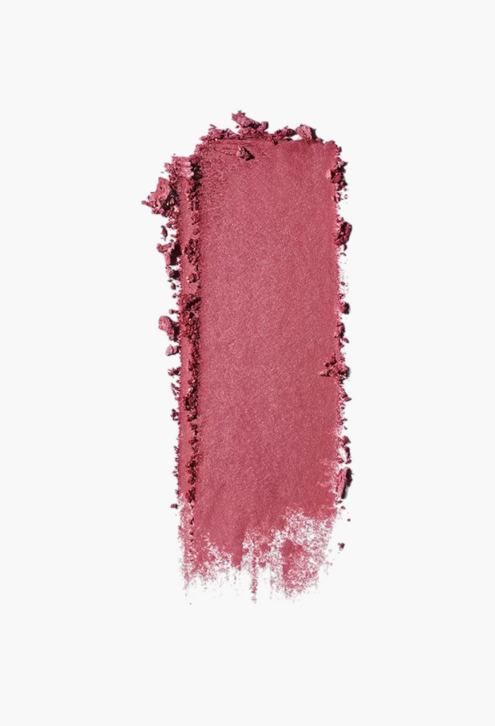 GLAM MODA Saie SuperSuede Radiant Blush powder swatch in a deep berry pink shade with a smooth, radiant finish.