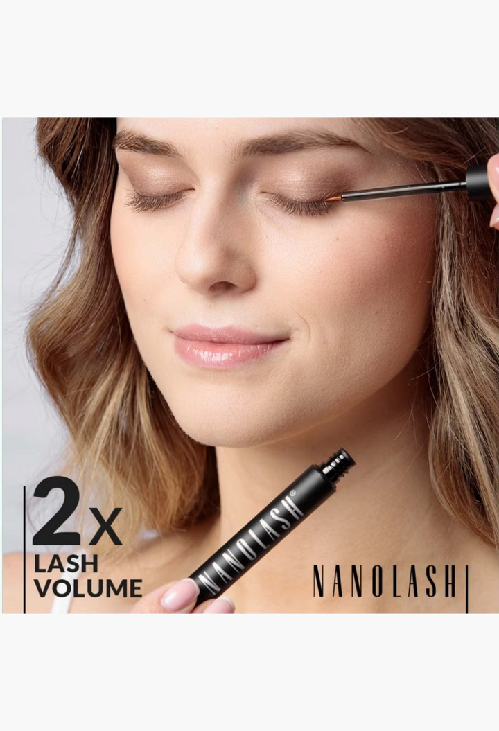 GLAM MODA Nanolash Eyelash Serum being applied to a woman's lash line with a thin applicator brush