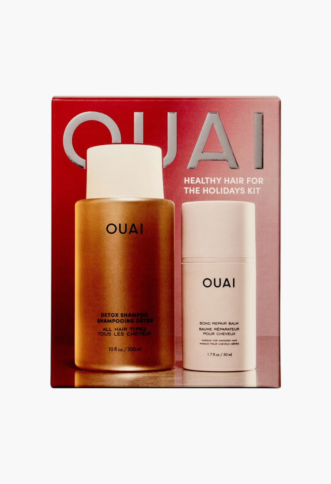 GLAM MODA OUAI Healthy Hair for the Holidays kit featuring a Detox Shampoo bottle and a Bond Repair Balm tube.