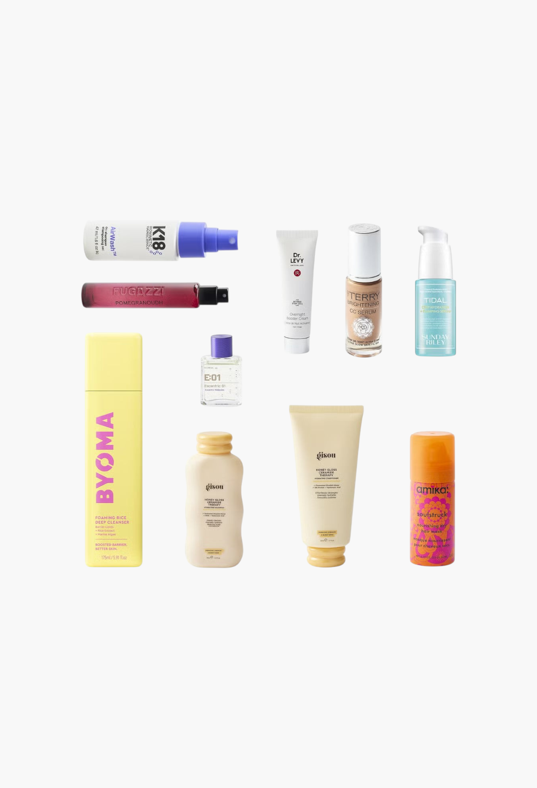 GLAM MODA beauty product collection featuring skincare, hair care, and fragrance items in various bottles and tubes.
