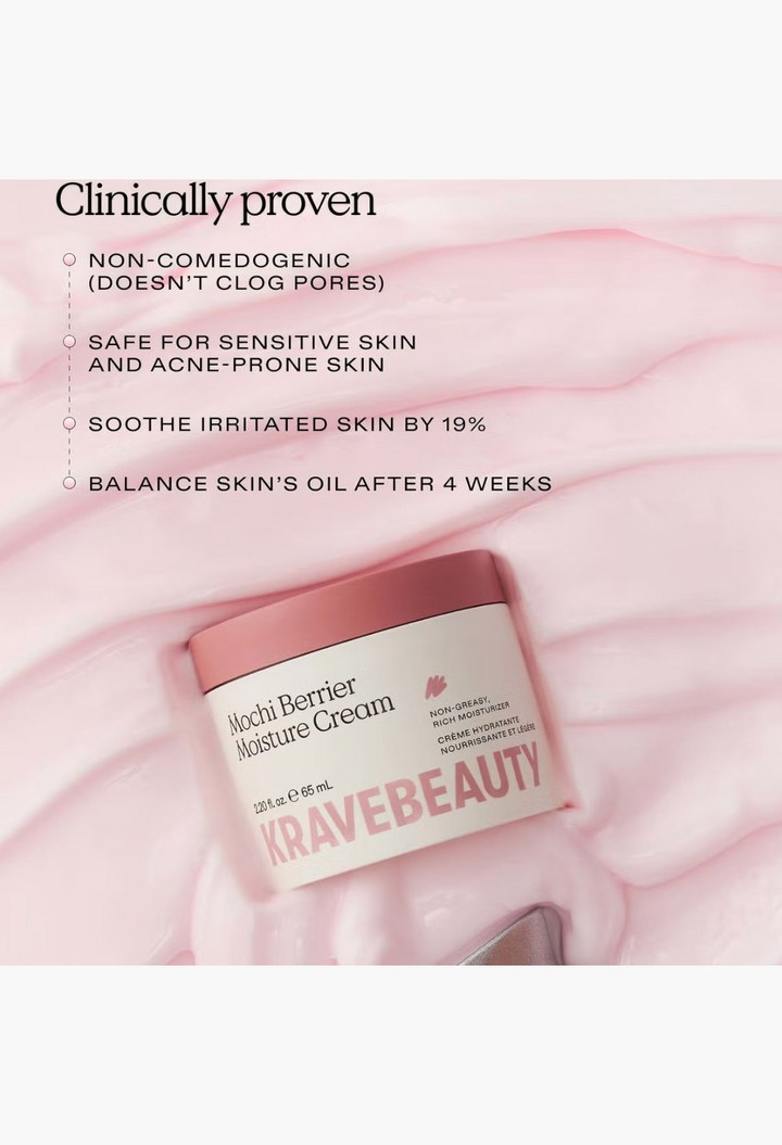 GLAM MODA KraveBeauty Mochi Berrier Moisture Cream in a pink jar with a splash of cream on a white background.