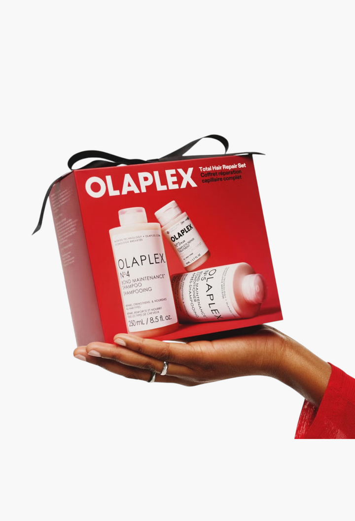 GLAM MODA Olaplex Total Hair Repair Set featuring bond-building shampoo, conditioner, and treatment in a red gift box.
