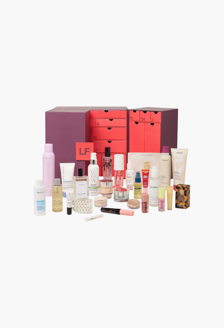 GLAM MODA beauty advent calendar with 25 drawers and a collection of 27 skincare, makeup, and haircare products.