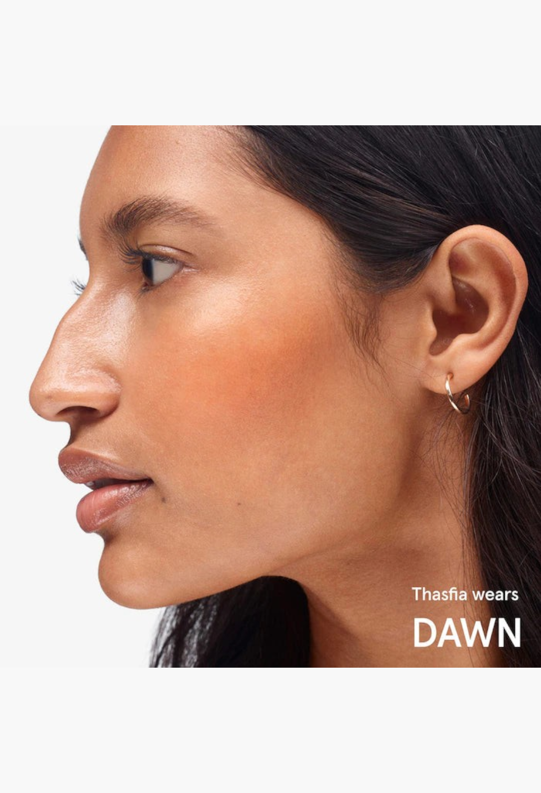 GLAM MODA Cloud Paint gel cream blush in Dawn shade applied to the cheek of a model for a natural dewy glow
