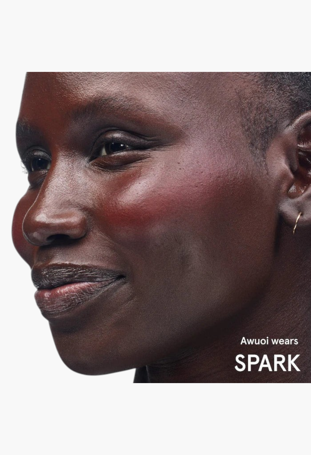 GLAM MODA Cloud Paint gel-cream blush in shade Spark applied to the cheek of a model for a natural dewy flush
