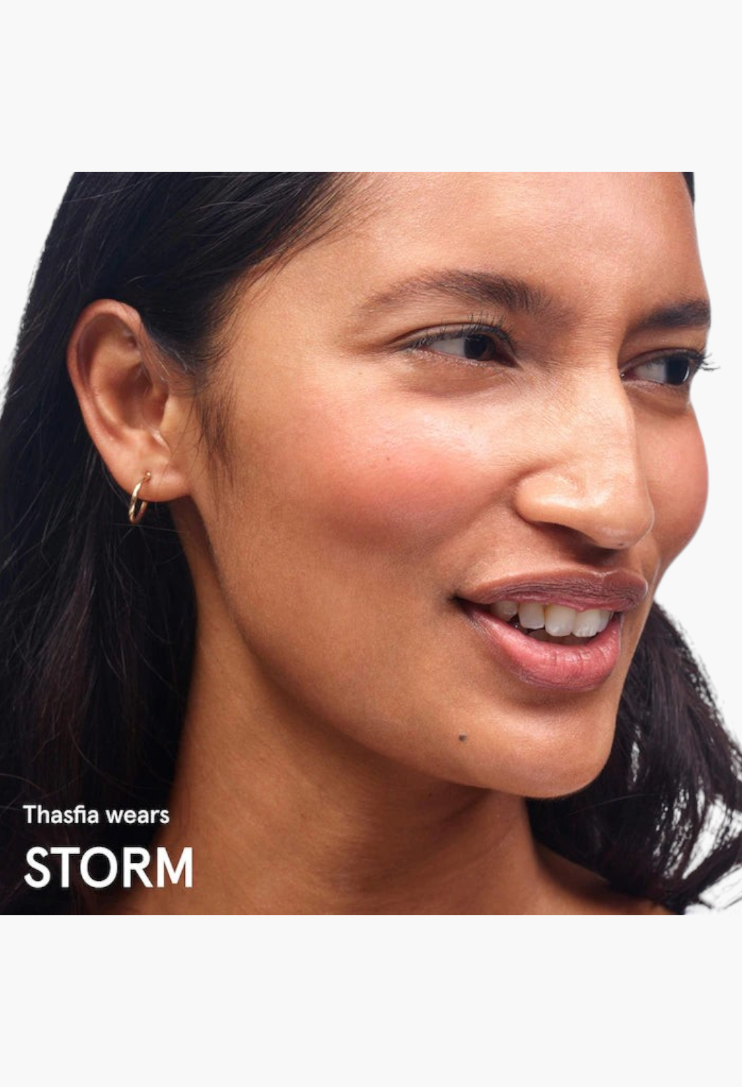 GLAM MODA Cloud Paint gel-cream blush in shade Storm applied to a model's cheeks for a natural dewy sunset flush