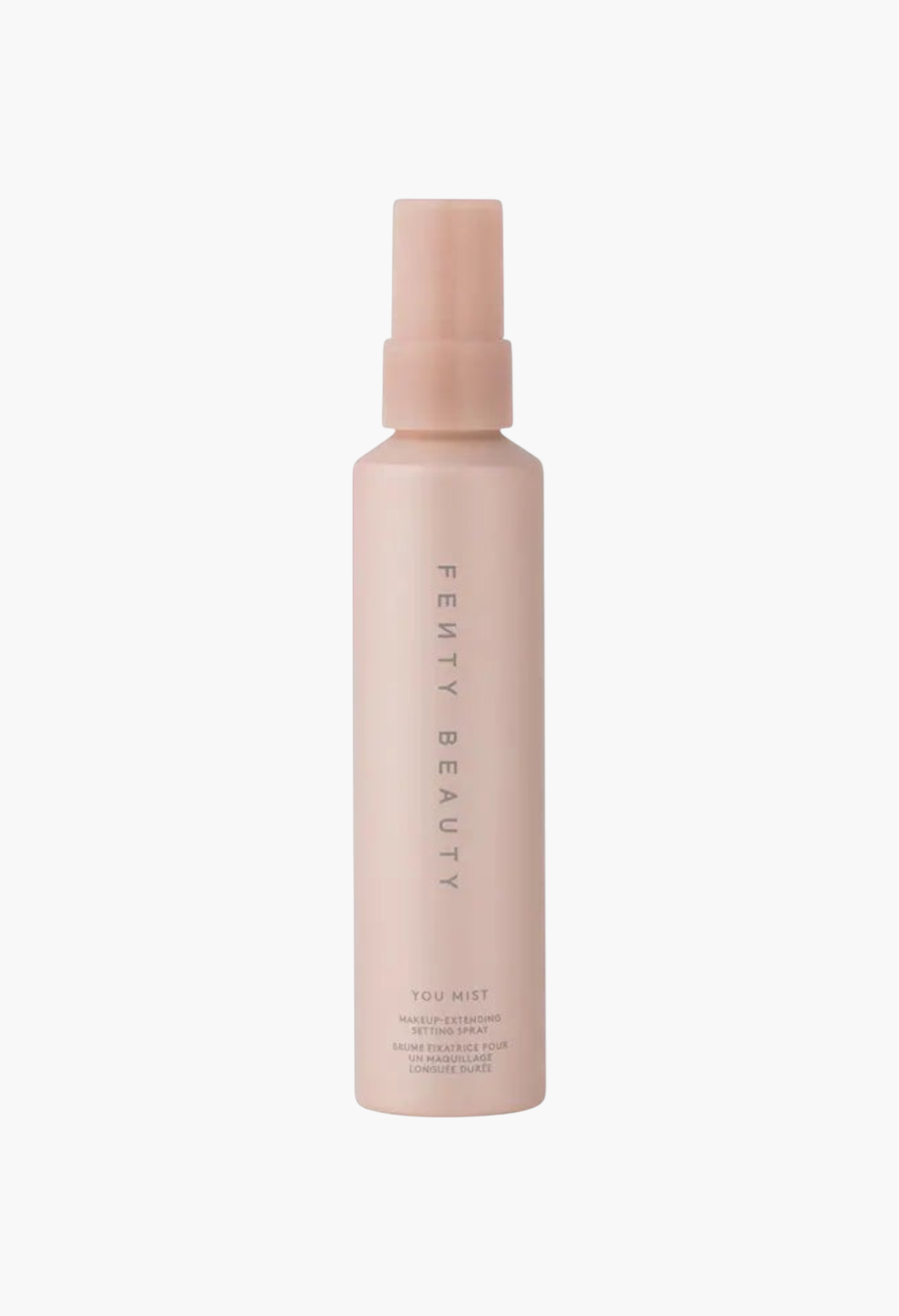 GLAM MODA Fenty Beauty You Mist makeup-extending setting spray in a tall, light pink pump bottle.