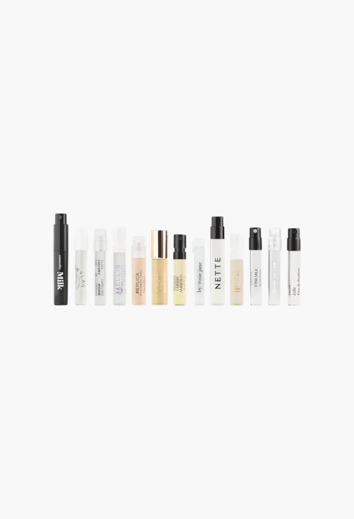 GLAM MODA perfume sampler set featuring 13 assorted luxury fragrance vials with a redeemable full-size scent voucher