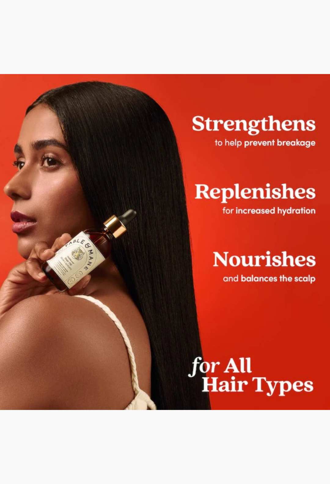 GLAM MODA model with long straight dark hair holding a Fable & Mane HoliRoots pre-wash scalp and hair treatment oil