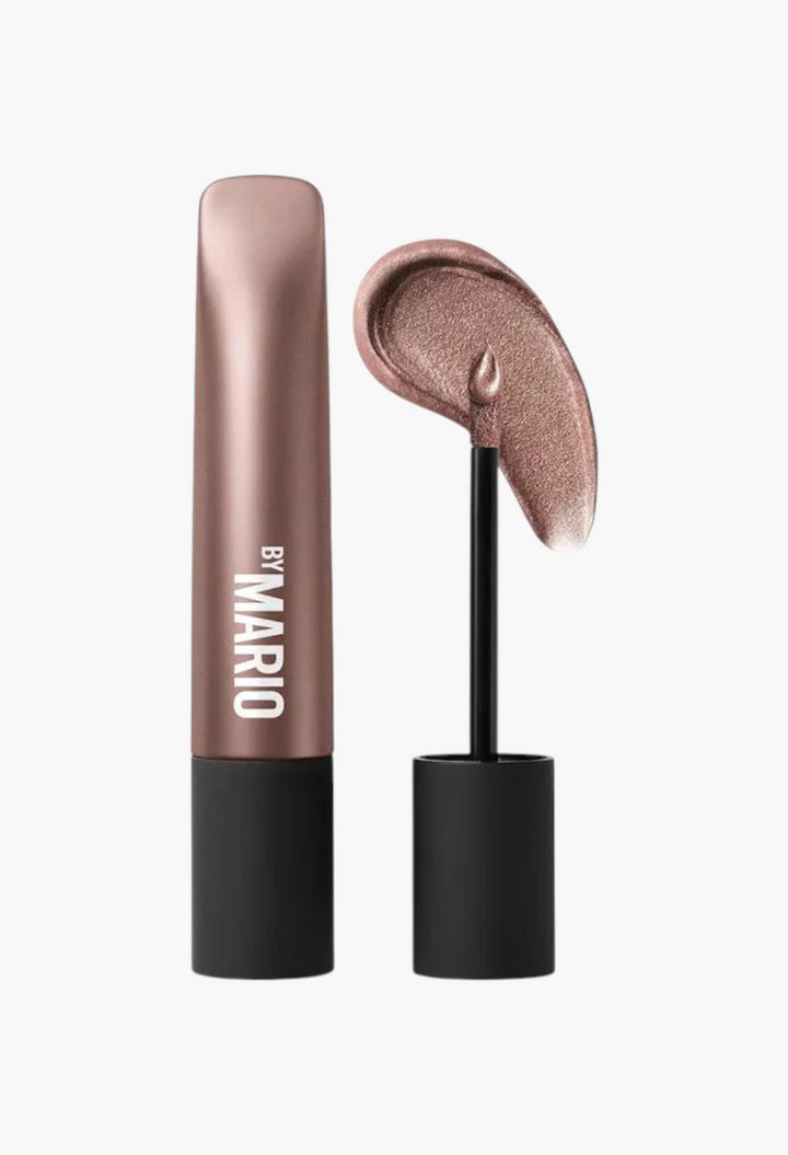 GLAM MODA long-wear cream eyeshadow in a shimmering bronze shade with doe-foot applicator and product swatch.