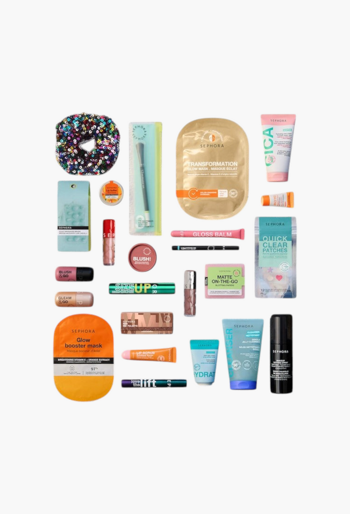 GLAM MODA 24-piece beauty advent calendar set featuring skincare, makeup, and accessories in a sequined vanity case.