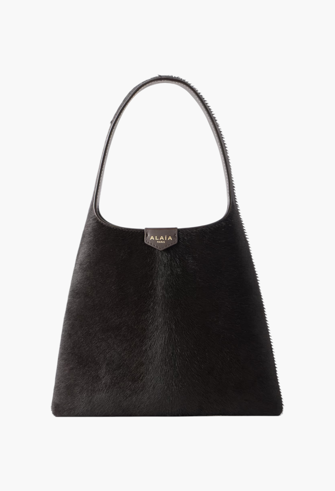 GLAM MODA Alaïa mini shoulder bag in dark brown calf hair with a slouchy silhouette and leather shoulder strap
